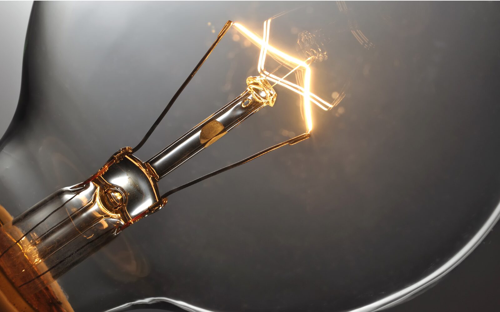 Close-up of a glowing light bulb filament